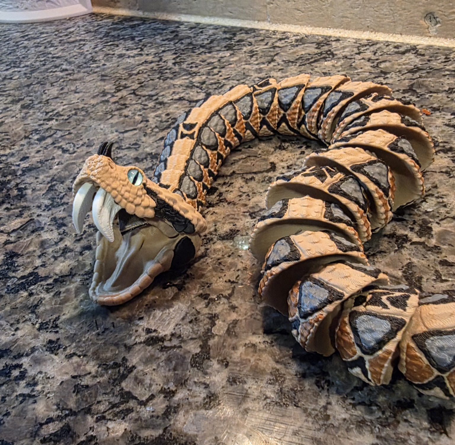 Articulated horned snake