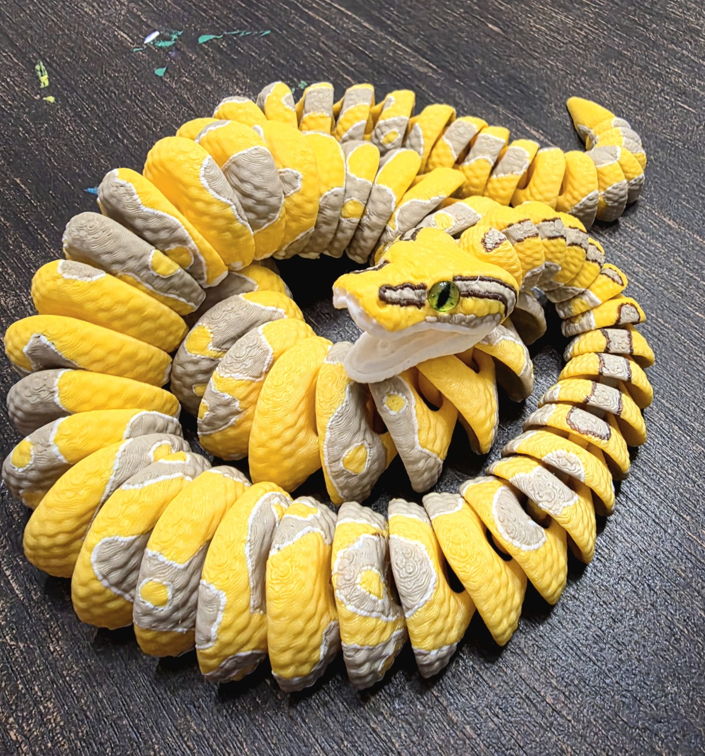 Articulated yellow snake